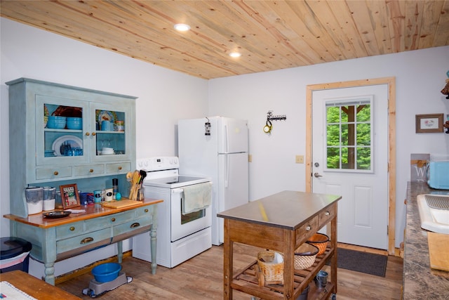 716 Kootenai River Rd, Troy, MT 59935 - kitchen featuring white appliances, light wood-type flooring, wooden ceiling, and recessed lighting