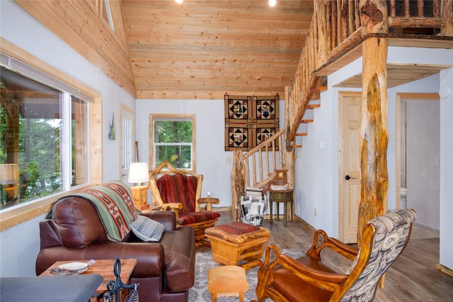 716 Kootenai River Rd, Troy, MT 59935 - living room with stairway, wood finished floors, wood ceiling, and high vaulted ceiling