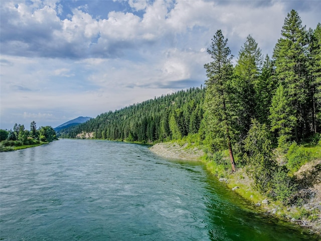 716 Kootenai River Rd, Troy, MT 59935 - water view featuring a heavily wooded area