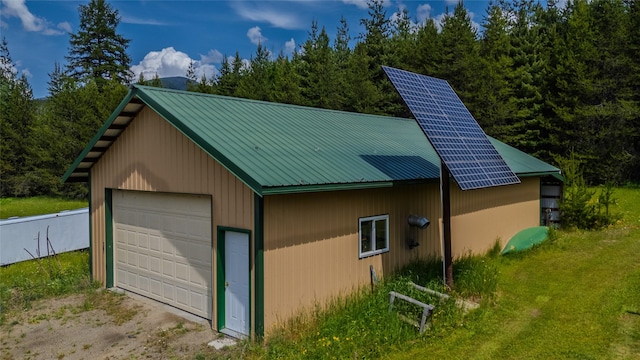17 Twenty Peak Gulch Ln, Trout Creek, MT 59874 - detached garage with dirt driveway
