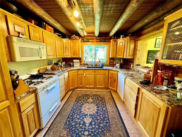 17 Twenty Peak Gulch Ln, Trout Creek, MT 59874 - kitchen with white appliances, rustic walls, a wood ceiling with exposed beams, light stone countertops, and glass insert cabinets