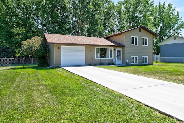 3875 Kiki Dr Unit 3875, Helena, MT 59602 - tri-level home with a garage and driveway
