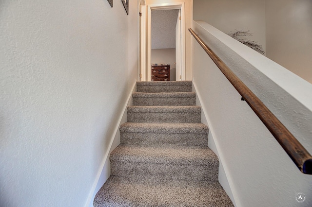 3875 Kiki Dr Unit 3875, Helena, MT 59602 - stairway featuring a textured wall