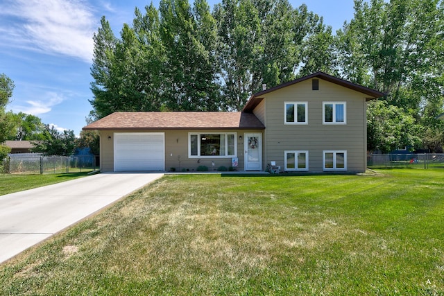 3875 Kiki Dr Unit 3875, Helena, MT 59602 - tri-level home with an attached garage and driveway