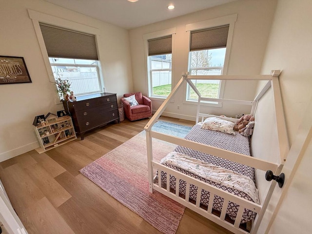 123 Owl Loop, Kalispell, MT 59901 - bedroom featuring wood finished floors and recessed lighting