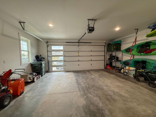 123 Owl Loop, Kalispell, MT 59901 - garage featuring a garage door opener and recessed lighting