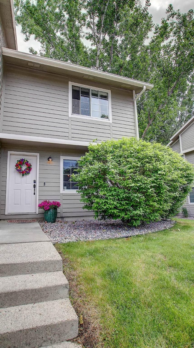 5530 Creekstone Dr Unit 6, Missoula, MT 59808 - view of front facade featuring a front lawn