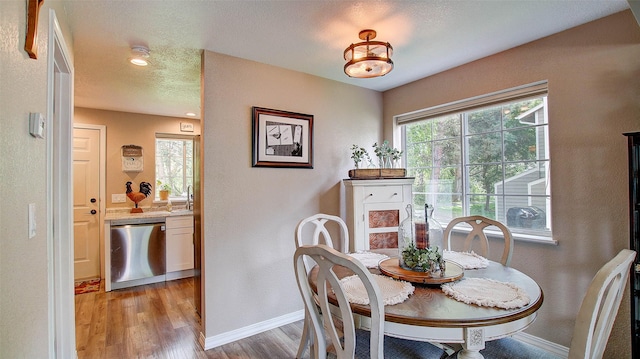 5530 Creekstone Dr Unit 6, Missoula, MT 59808 - dining space featuring light wood-style flooring and recessed lighting