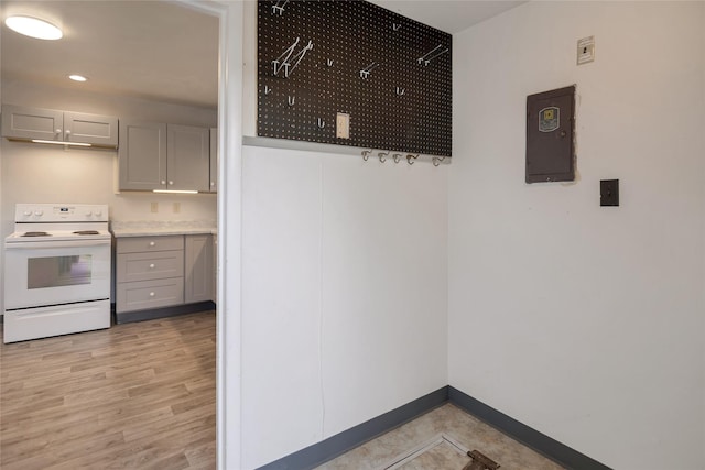 541 5th Ave, Helena, MT 59601 - kitchen featuring electric stove, gray cabinets, light wood-style flooring, light countertops, and recessed lighting
