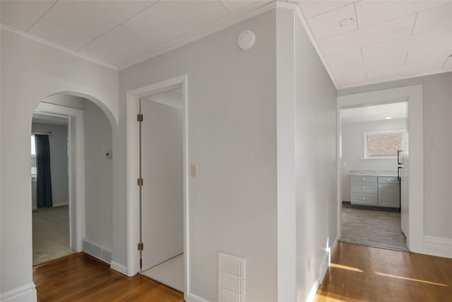 541 5th Ave, Helena, MT 59601 - hall featuring wood finished floors, arched walkways, and crown molding