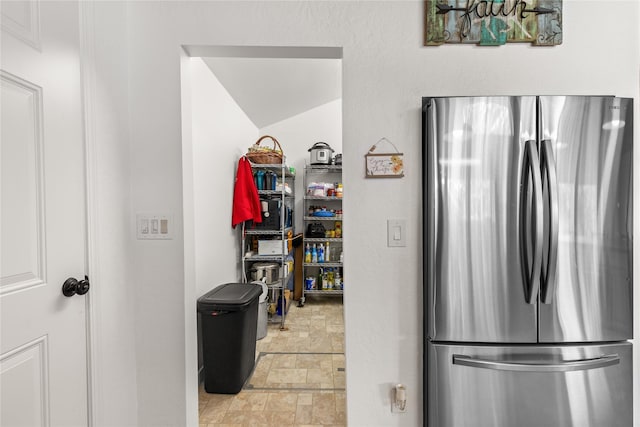 4291 Williams Ln, Stevensville, MT 59870 - kitchen featuring freestanding refrigerator and stone tile floors