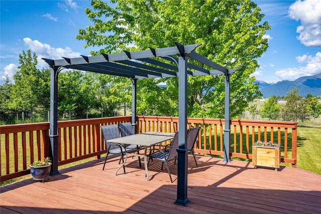 4291 Williams Ln, Stevensville, MT 59870 - deck featuring a pergola, outdoor dining area, and a mountain view