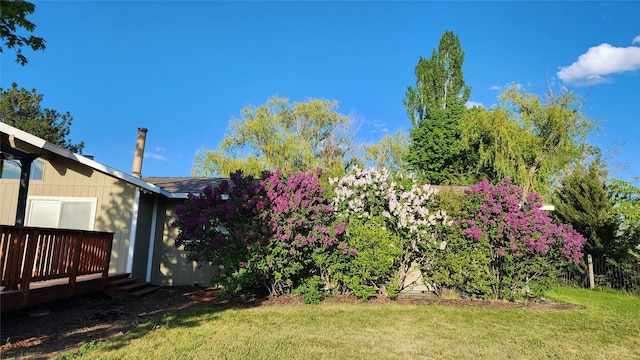 4291 Williams Ln, Stevensville, MT 59870 - view of green lawn with a wooden deck