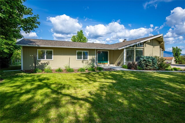 4291 Williams Ln, Stevensville, MT 59870 - ranch-style house featuring a front lawn