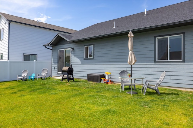 522 Pheasant Ln, Kalispell, MT 59901 - back of house with roof with shingles