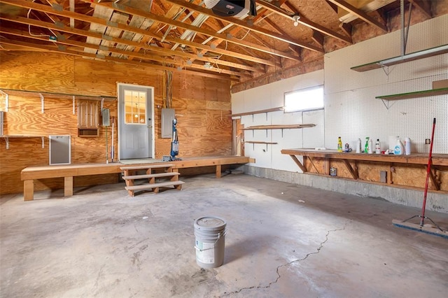 8340 Green Meadow Dr, Helena, MT 59602 - garage featuring a workshop area and a garage door opener