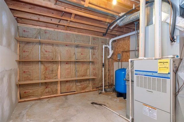 8340 Green Meadow Dr, Helena, MT 59602 - unfinished basement featuring a water pressure tank and heating unit