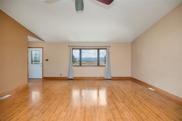 8340 Green Meadow Dr, Helena, MT 59602 - empty room with a ceiling fan and light wood finished floors