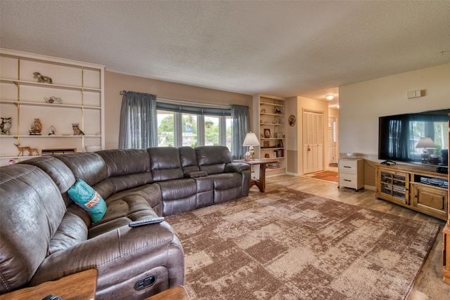 238 Hillcrest Dr, Hamilton, MT 59840 - living room with a textured ceiling and wood finished floors