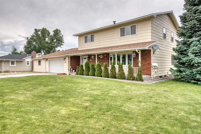 238 Hillcrest Dr, Hamilton, MT 59840 - traditional-style home with a garage, brick siding, and a front yard
