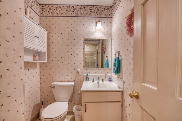 238 Hillcrest Dr, Hamilton, MT 59840 - half bath featuring wallpapered walls and vanity