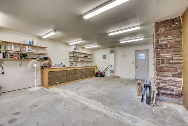 238 Hillcrest Dr, Hamilton, MT 59840 - garage featuring a workshop area