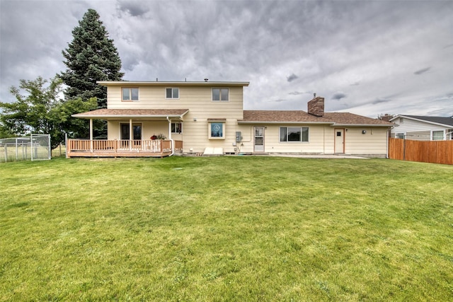 238 Hillcrest Dr, Hamilton, MT 59840 - rear view of property with a deck, a chimney, and a patio area