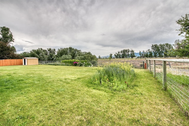 238 Hillcrest Dr, Hamilton, MT 59840 - view of yard with a shed and a view of countryside