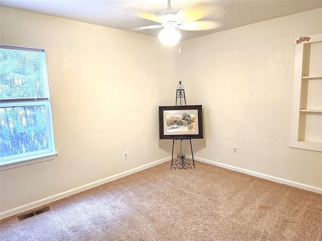 1109 W Main St, Hamilton, MT 59840 - empty room featuring carpet flooring and ceiling fan