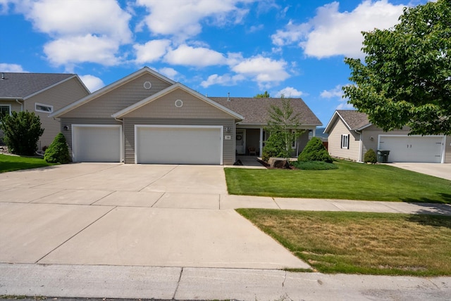 36 W Northview Loop, Kalispell, MT 59901 - view of front of home with a garage, a front yard, and driveway