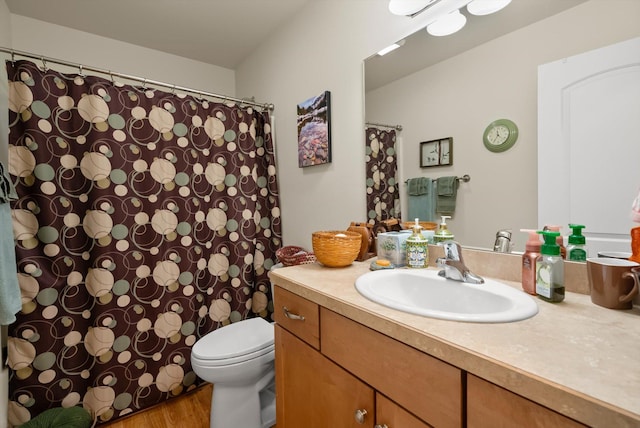 36 W Northview Loop, Kalispell, MT 59901 - full bath featuring vanity, wood finished floors, and a shower with shower curtain