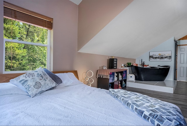 2075 Lion Mountain Loop Rd, Whitefish, MT 59937 - bedroom with lofted ceiling and wood finished floors