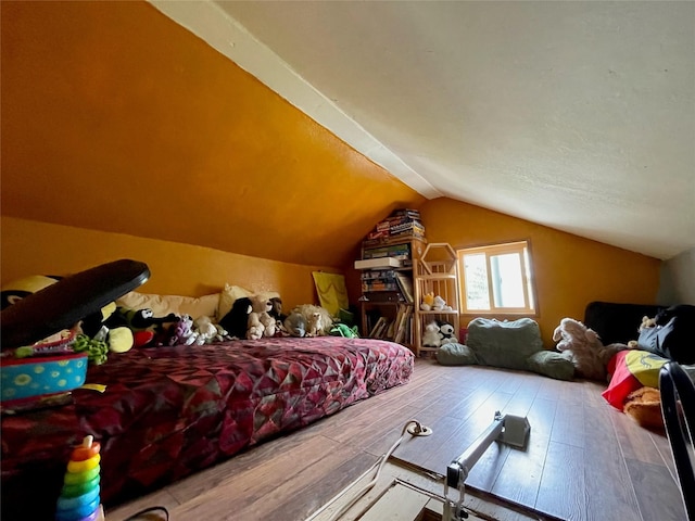 2075 Lion Mountain Loop Rd, Whitefish, MT 59937 - bedroom featuring wood finished floors and lofted ceiling