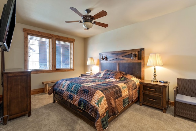7175 US Highway 93 S Unit 4-102, Lakeside, MT 59922 - bedroom with light colored carpet and ceiling fan