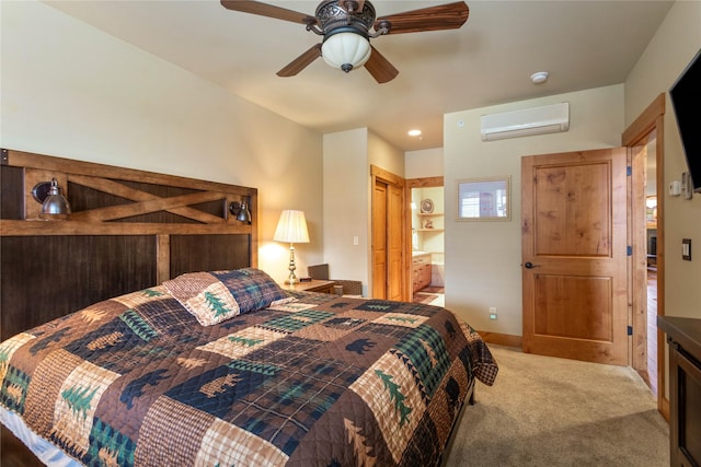 7175 US Highway 93 S Unit 4-102, Lakeside, MT 59922 - carpeted bedroom featuring an AC wall unit, ensuite bathroom, and a ceiling fan