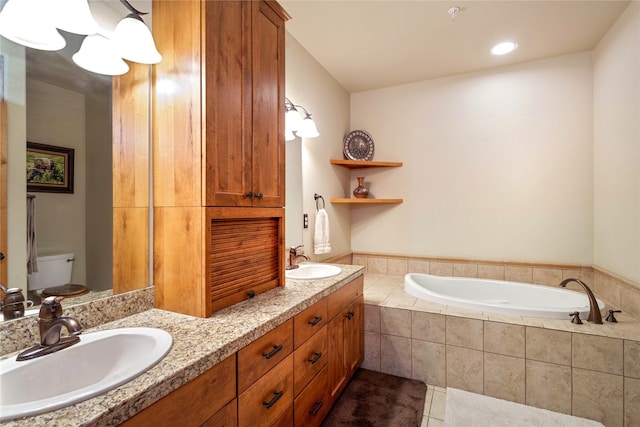 7175 US Highway 93 S Unit 4-102, Lakeside, MT 59922 - bathroom featuring double vanity, a garden tub, and tile patterned flooring