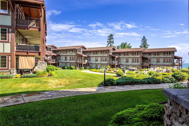 7175 US Highway 93 S Unit 4-102, Lakeside, MT 59922 - surrounding community with a lawn and a residential view