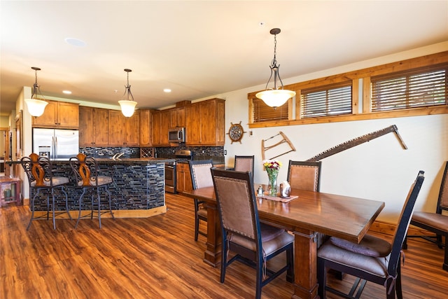 7175 US Highway 93 S Unit 4-102, Lakeside, MT 59922 - dining area with dark wood-type flooring and recessed lighting