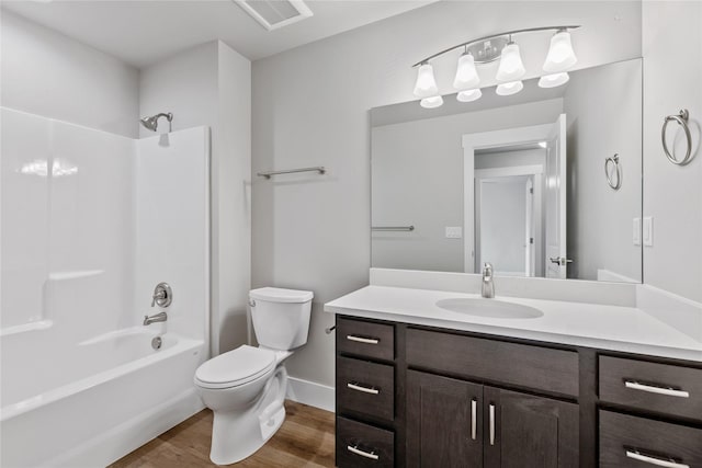 534 Colorado Ave, Whitefish, MT 59937 - bathroom featuring vanity, wood finished floors, and tub / shower combination