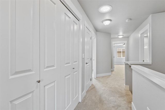 534 Colorado Ave, Whitefish, MT 59937 - corridor featuring light colored carpet and baseboards