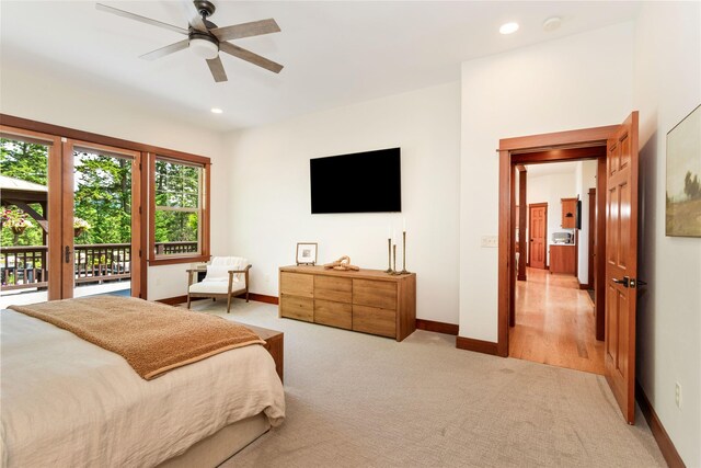 255 Windsor Ct, Bigfork, MT 59911 - bedroom with access to outside, light colored carpet, ceiling fan, and recessed lighting