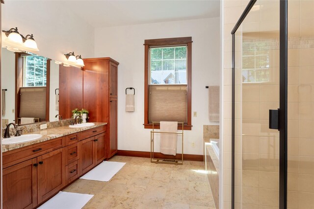 255 Windsor Ct, Bigfork, MT 59911 - bathroom with double vanity, a bath, and a tile shower