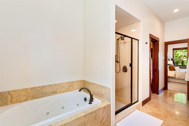 255 Windsor Ct, Bigfork, MT 59911 - ensuite bathroom with a whirlpool tub, a shower stall, and recessed lighting