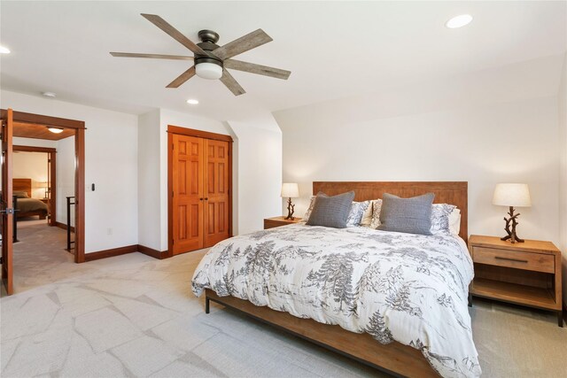 255 Windsor Ct, Bigfork, MT 59911 - bedroom featuring light carpet, recessed lighting, a ceiling fan, and a closet