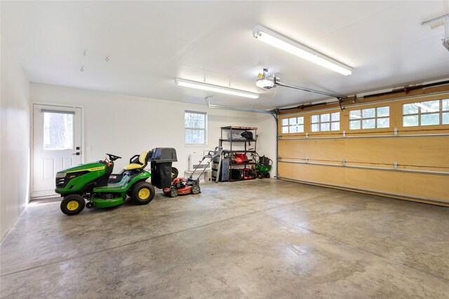 255 Windsor Ct, Bigfork, MT 59911 - garage featuring a garage door opener