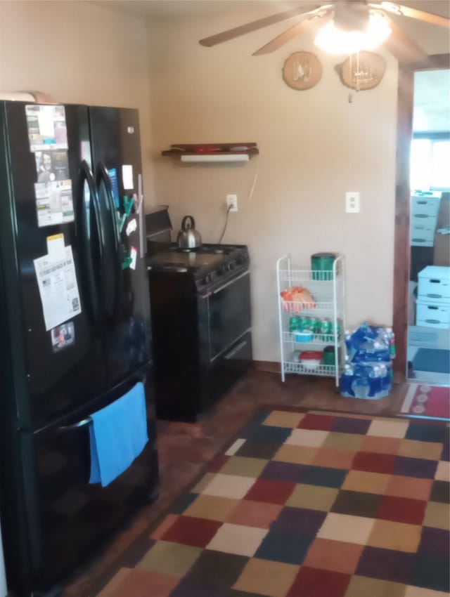 4117 Sherlock Ln, Lincoln, MT 59639 - kitchen with black appliances and a ceiling fan