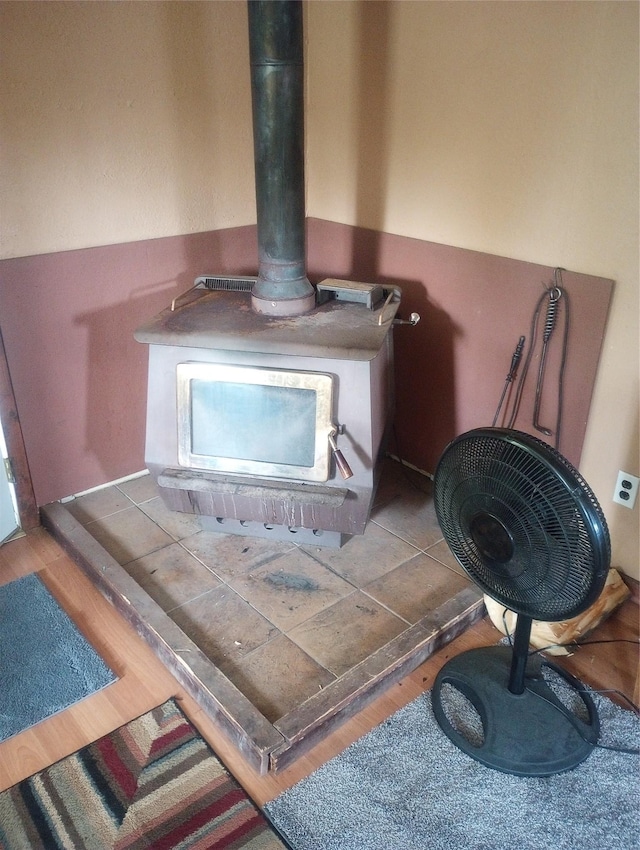 4117 Sherlock Ln, Lincoln, MT 59639 - detailed view of a wood stove and wood finished floors