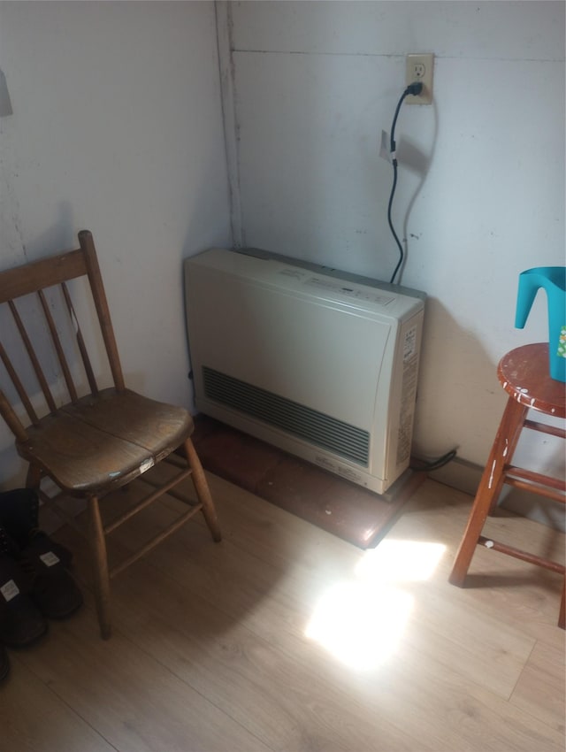 4117 Sherlock Ln, Lincoln, MT 59639 - detailed view of heating unit and wood finished floors