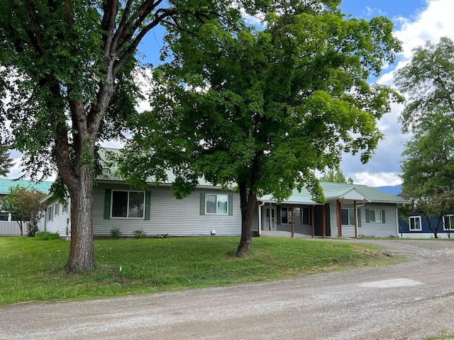 214 Church St, Thompson Falls, MT 59873 - single story home featuring driveway and a front lawn