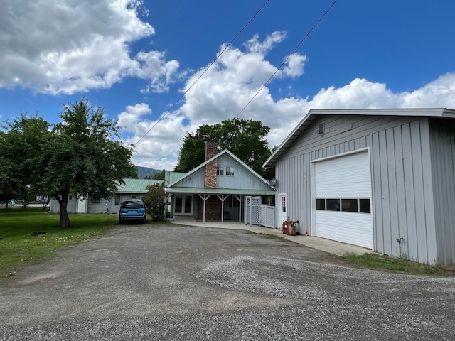 214 Church St, Thompson Falls, MT 59873 - detached garage featuring driveway